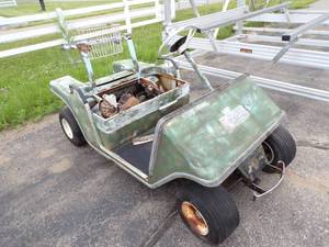 lot 7 image: EZ Go Golf Cart for parts or repair