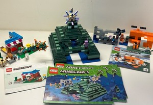 lot 209 image: LEGO Minecraft Building Set Collection - Sets 21136, 21184, and 21178