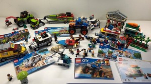 lot 214 image: LEGO City Collection with Vehicles, Boats, and Accessories