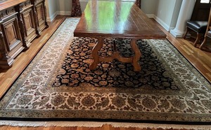 lot 5 image: Oriental Wool Area Rug with Intricate Floral Design