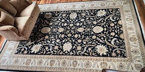 lot 8 image: Large Floral Patterned Area Rug with Black Background