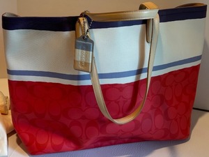 lot 76 image: Coach Signature Multicolor Tote Bag with Dust Bag