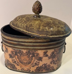 lot 85 image: Vintage Metal Tin with Ornate Lid and Decorative Floral Design