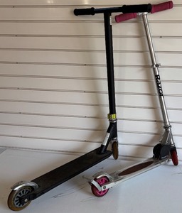 lot 103 image: Pair of Used Razor Scooters - Black Label and Standard Model