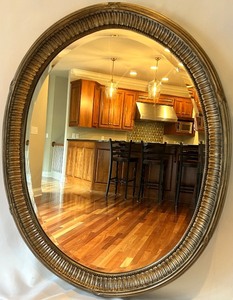 lot 32 image: Oval Wall Mirror with Silver Frame by Lucy Interior Design