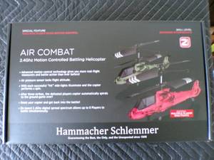 lot 20 image: New Hammacher Schlemmer Air Combat Battling Helicopter