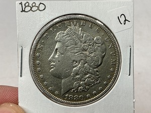 lot 12 image: 1880 Morgan Silver Dollar