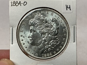 lot 14 image: 1884-O Morgan Silver Dollar