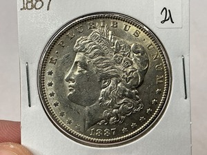 lot 21 image: 1887 Morgan Silver Dollar