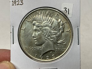 lot 31 image: 1923 Peace Silver Dollar