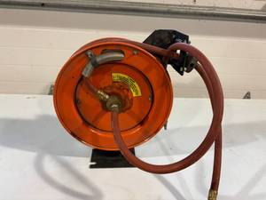 lot 64 image: Air Hose on Reel