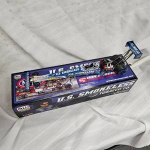 lot 6 image: NHRA 124 Spencer Massey Top Fuel Dragster by Don Arudhomme