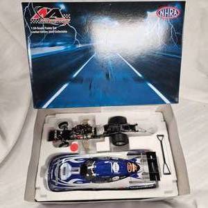 lot 15 image: NHRA 124 Brute Funny Car by Motorsports Authentics