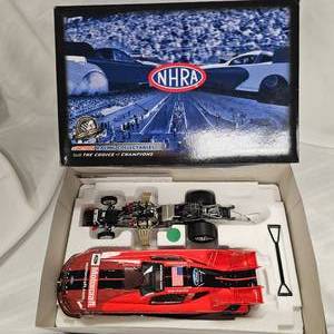 lot 21 image: NHRA 124 Bob Tasca III Ford Motorsports Funny Car by Action Racing