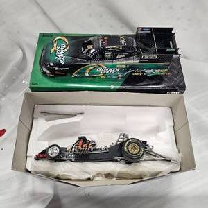lot 43 image: NHRA 124   Quaker State Funny Car by Action Racing