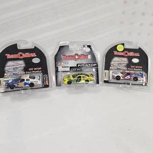 lot 117 image: 164 Team Caliber #17 R&L Carriers, #36 Centrix, #6 Kraft (3)