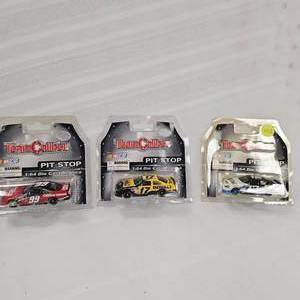 lot 123 image: 164 Team Caliber #99 Office Max, #17 Dewalt, #12 Alltel(3)