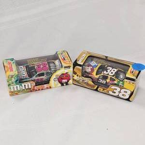 lot 108 image: 164 Nascar DLX Elliot Sadler #38, Snickers, M&Ms Groovy(2)