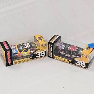 lot 110 image: 164 Nascar DLX Elliot Sadler #38, Snickers, M&Ms (2)
