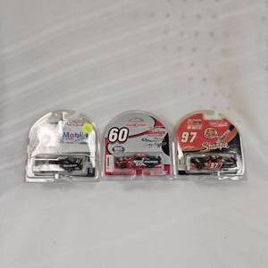 lot 112 image: 164 Team Caliber #60 Grainger, #12 Mobil, #97 Sharpie, #8 Bass Pro(4)