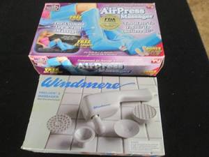 lot 232 image: New in box personal massage devices...