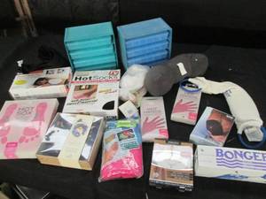 lot 185 image: Hot socks heat wrap storage organi...