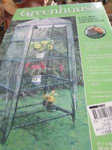 lot 304 image: New in Box 4-Tier Mini Greenhouse w...