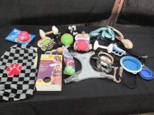 lot 135 image: Pet leashes, harnesses, toys and mo...