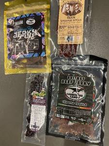 lot 21 image: Assortment of Gourmet Jerky & Sausage Sticks