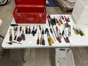 lot 175 image: TABLE FULL OF SCREWDRIVERS W TOOLBOX