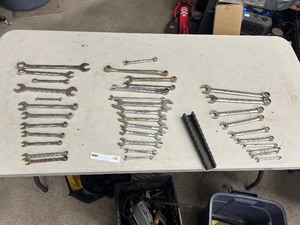 lot 178 image: TABLE FULL OF CRAFTSMAN WRENCHES