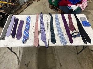 lot 208 image: TABLE FULL OF TIES
