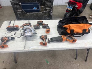 lot 46 image: RIDGID ELECTRIC TOOL SET W SOFT CASE.  DRILL, IMPACT DRILL, SAWZALL, SKILLSAW, 3 BATTERIES, & CHARGER