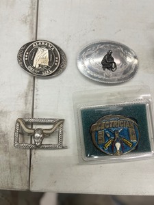 lot 63 image: 4 BELT BUCKLES