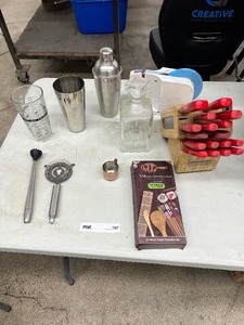 lot 107 image: TABLE FULL OF KITCHEN UTENSILS