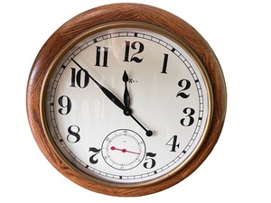 lot 45 image: Howard Miller Wall Clock with Wood Frame