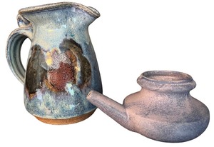 lot 57 image: Unique Ceramic Pitcher and Creamer Set
