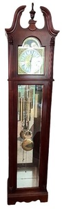 lot 9 image: Howard Miller 610-733 Grandfather Clock in Mahogany Finish
