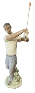 lot 35 image: Lladro Porcelain Figurine - Golfer in Swing Pose