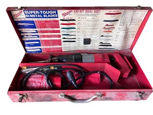 lot 129 image: Milwaukee Heavy-Duty Sawzall with Case and Accessories