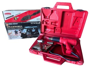 lot 131 image: Milwaukee Heat Gun with Attachments and Black & Decker Wallpaper Remover