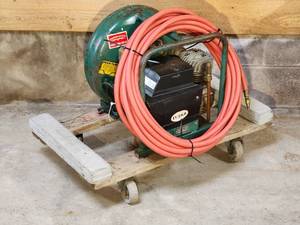 lot 53 image: Rol-Air 1-12 Hp Pancake Air Compressor with Hose on a Rolling Base