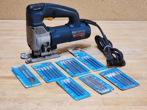 lot 191 image: Makita Electric Jig Saw with Assorted Blades