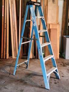 lot 209 image: Blue Werner 6 ft Fiberglass Ladder