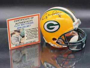 lot 113 image: Autographed Mini Helmet by Green Packers Great Clay Matthews with COA