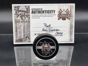 lot 37 image: NHL Hockey Puck Autographed by Future HOF Washington Capitals Great Alex Ovechkin with COA