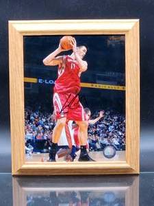 lot 124 image: Autographed Picture by Houston Rockets HOF Great Yao Ming No COA