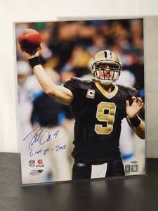 lot 107 image: Autographed Photo by Future HOF New Orleans Saints Great Quarterback Drew Brees with COA