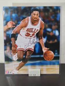 lot 127 image: Autographed Photo by Chicago Bulls HOF Great Scottie Pippen with COA