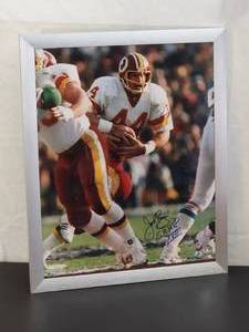 lot 116 image: Autographed Photo by Washington Redskins HOF Great John Riggins with COA
